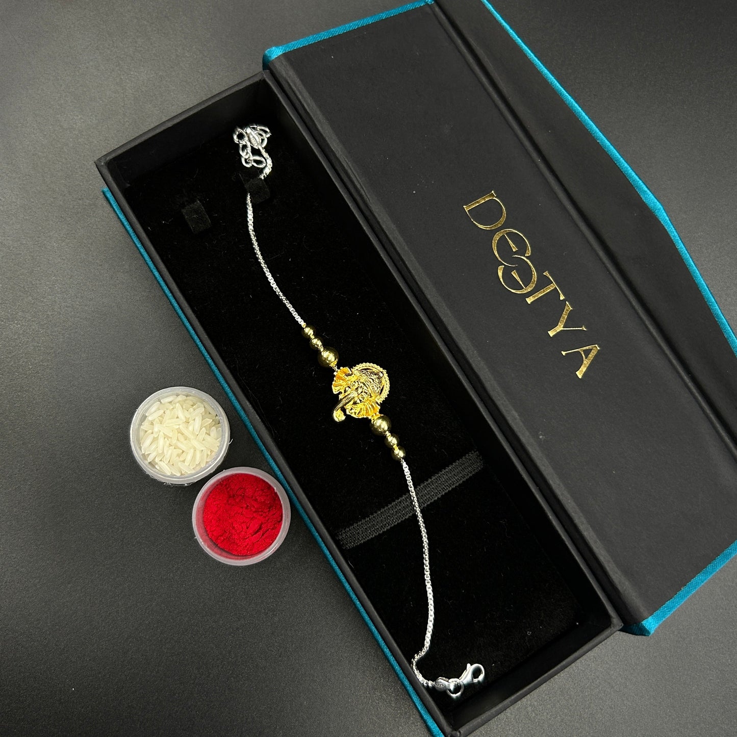 Yellow Gold Ganesh Rakhi without Rudraksh