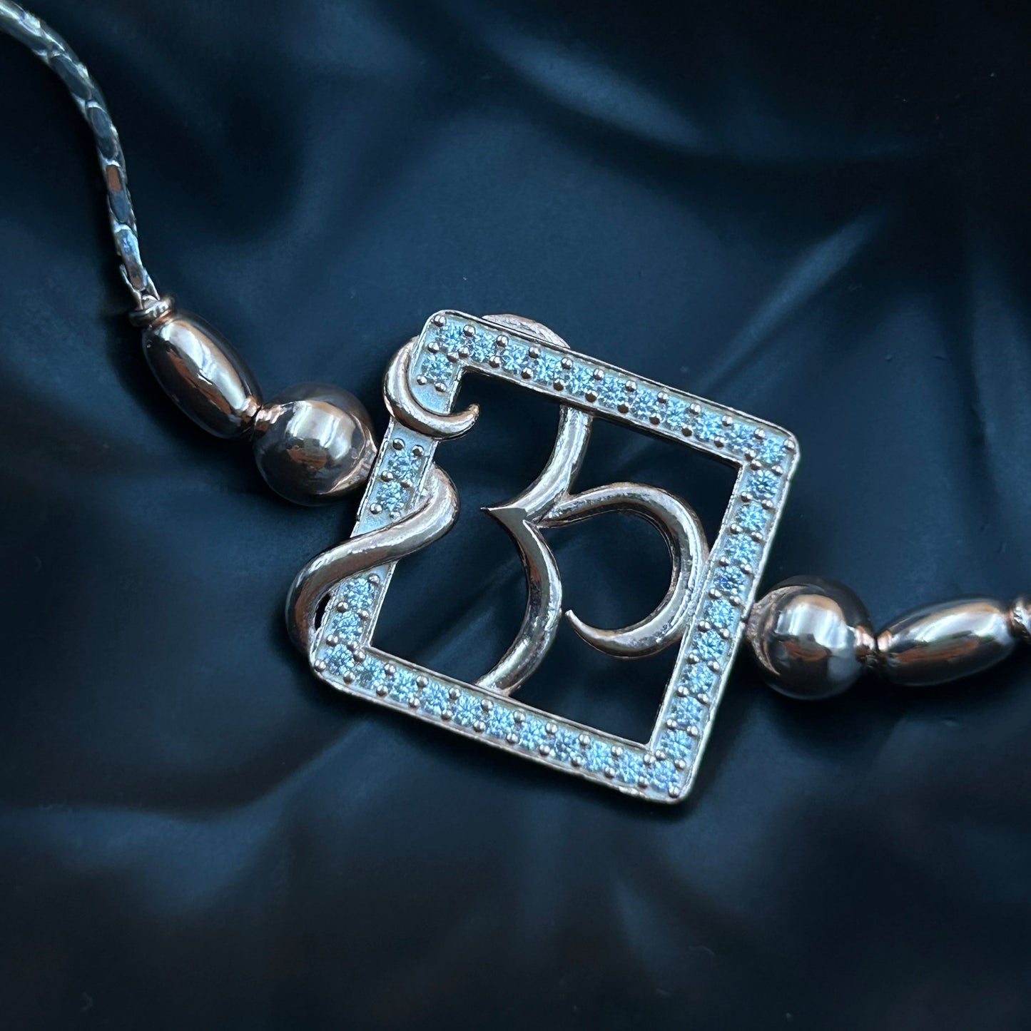 Silver Rakhi - OM Rakhi