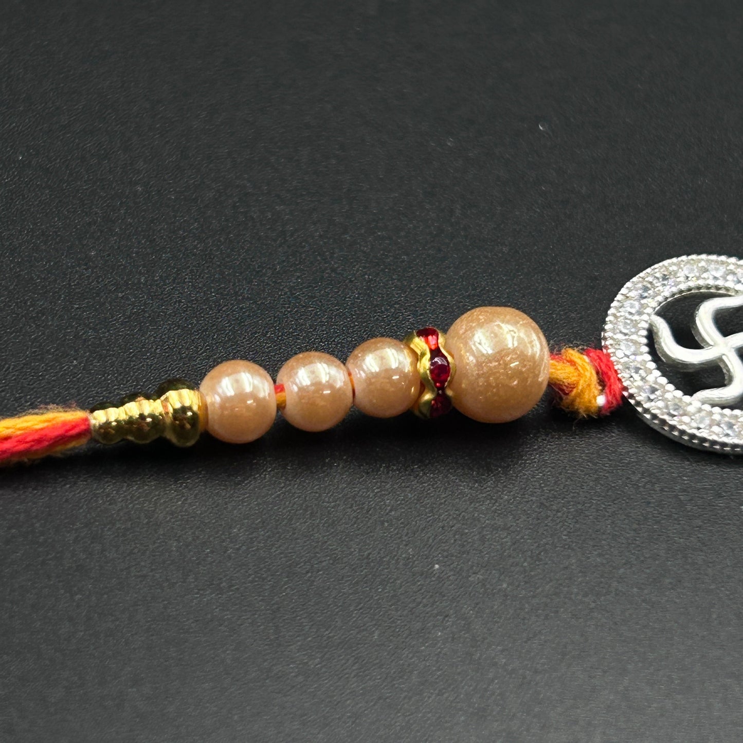 Pure Silver Swastik Rakhi - Thread Rakhi