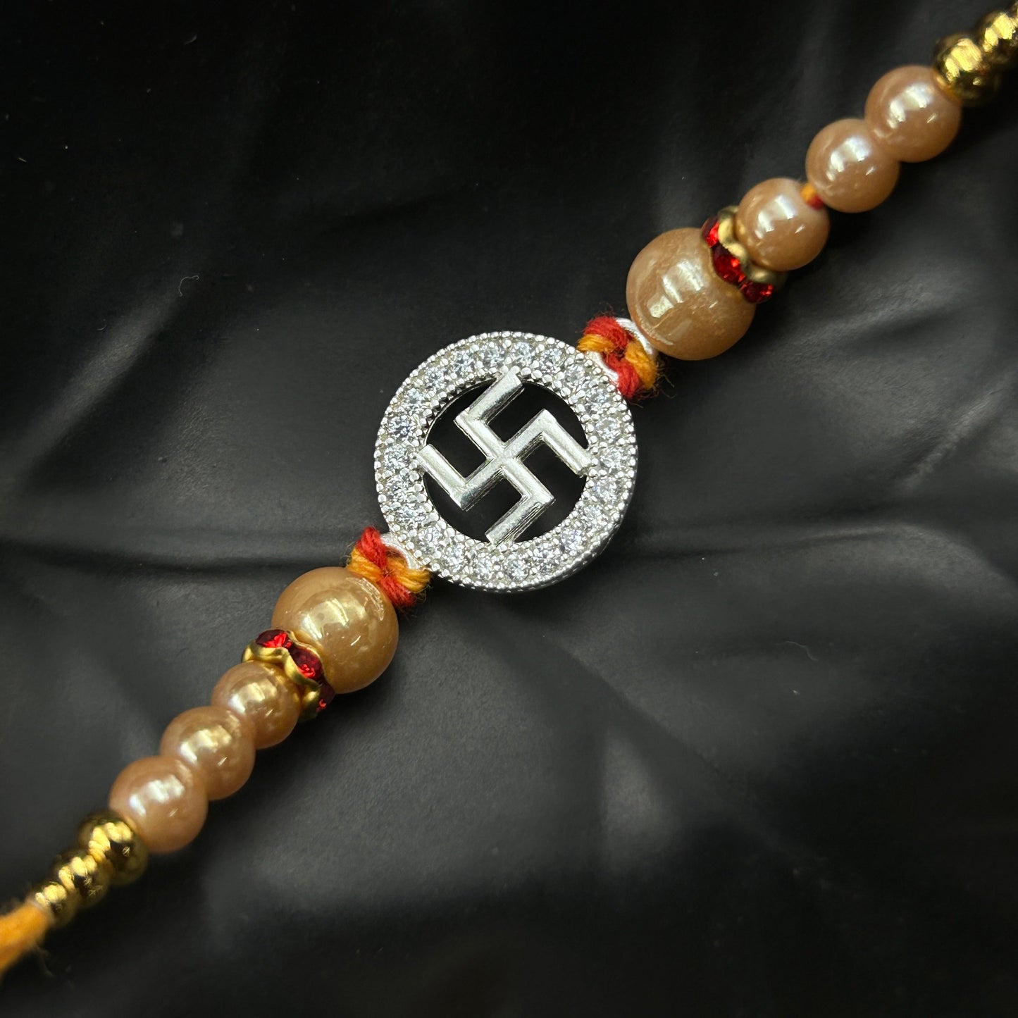 92.5 Swastik Rakhi Silver - Thread Rakhi