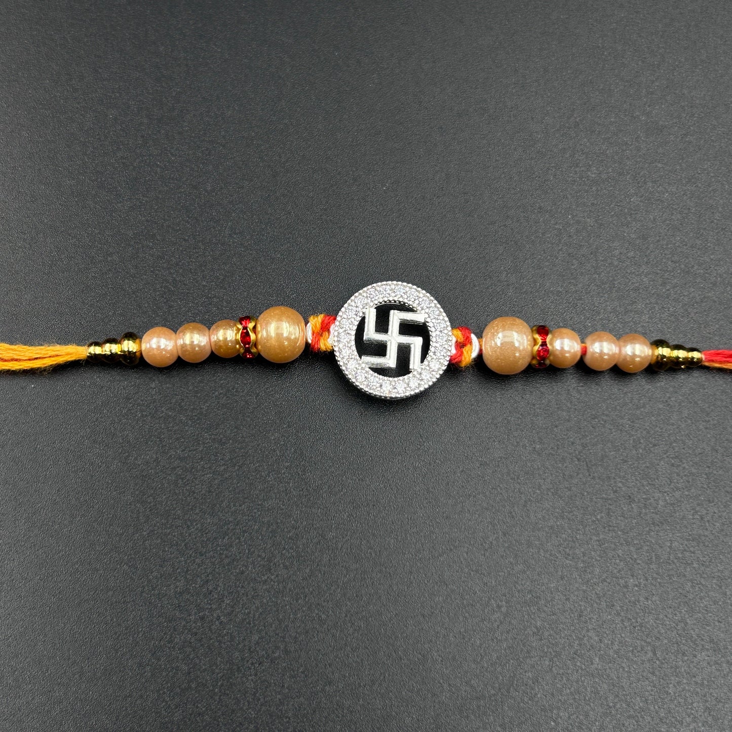 92.5 Swastik Rakhi Silver - Thread Rakhi