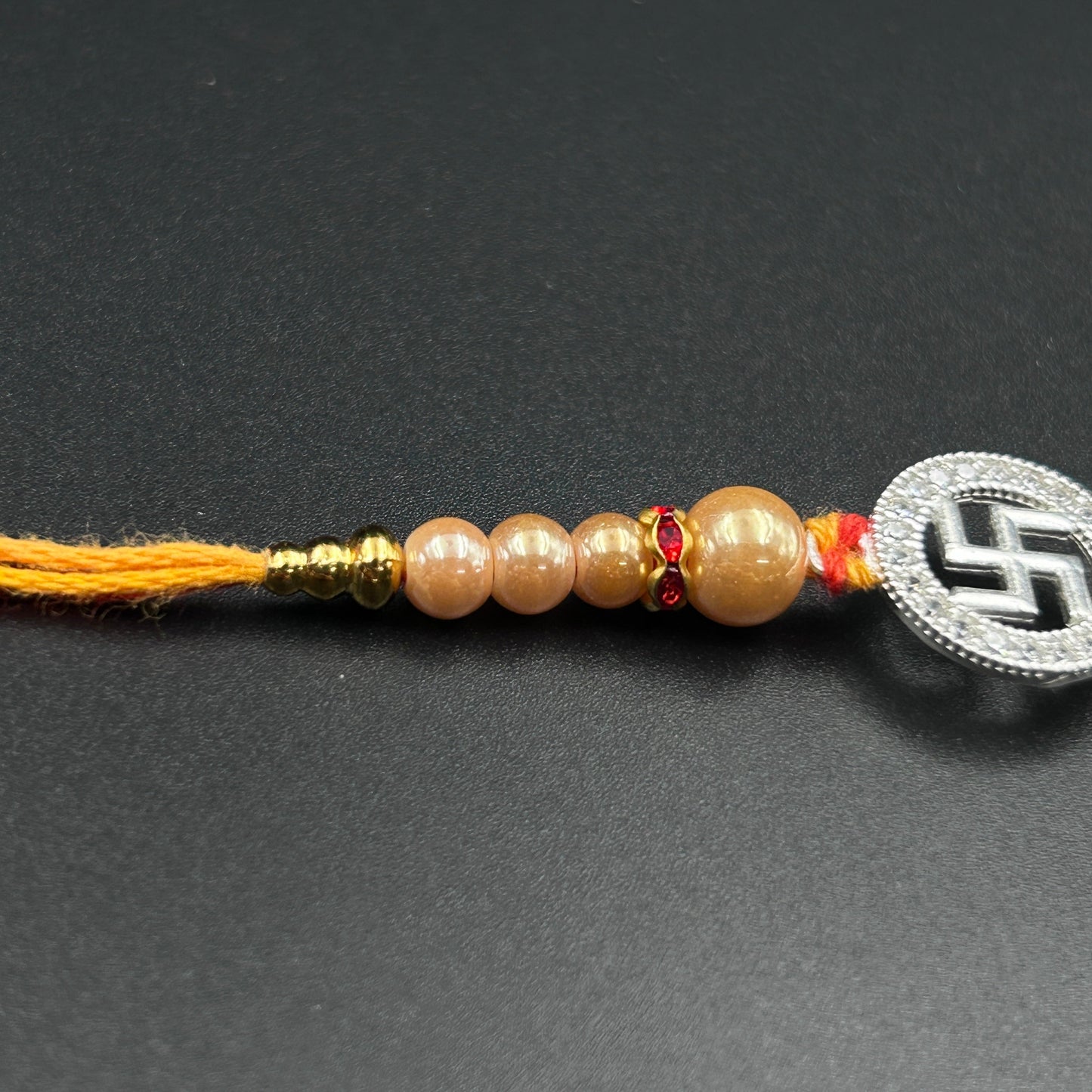 92.5 Swastik Rakhi Silver - Thread Rakhi