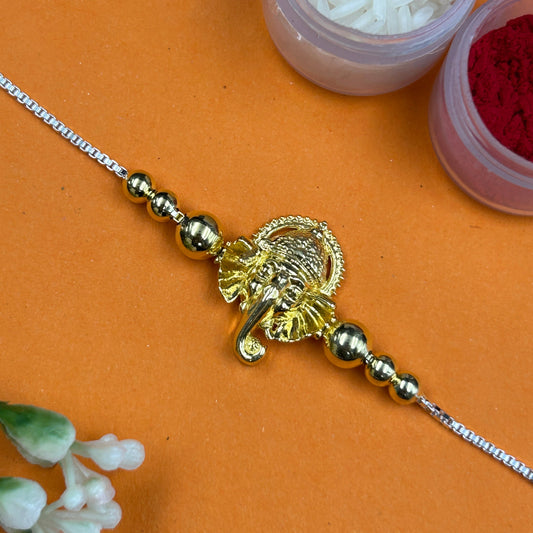 Yellow Gold Ganesh Rakhi without Rudraksh