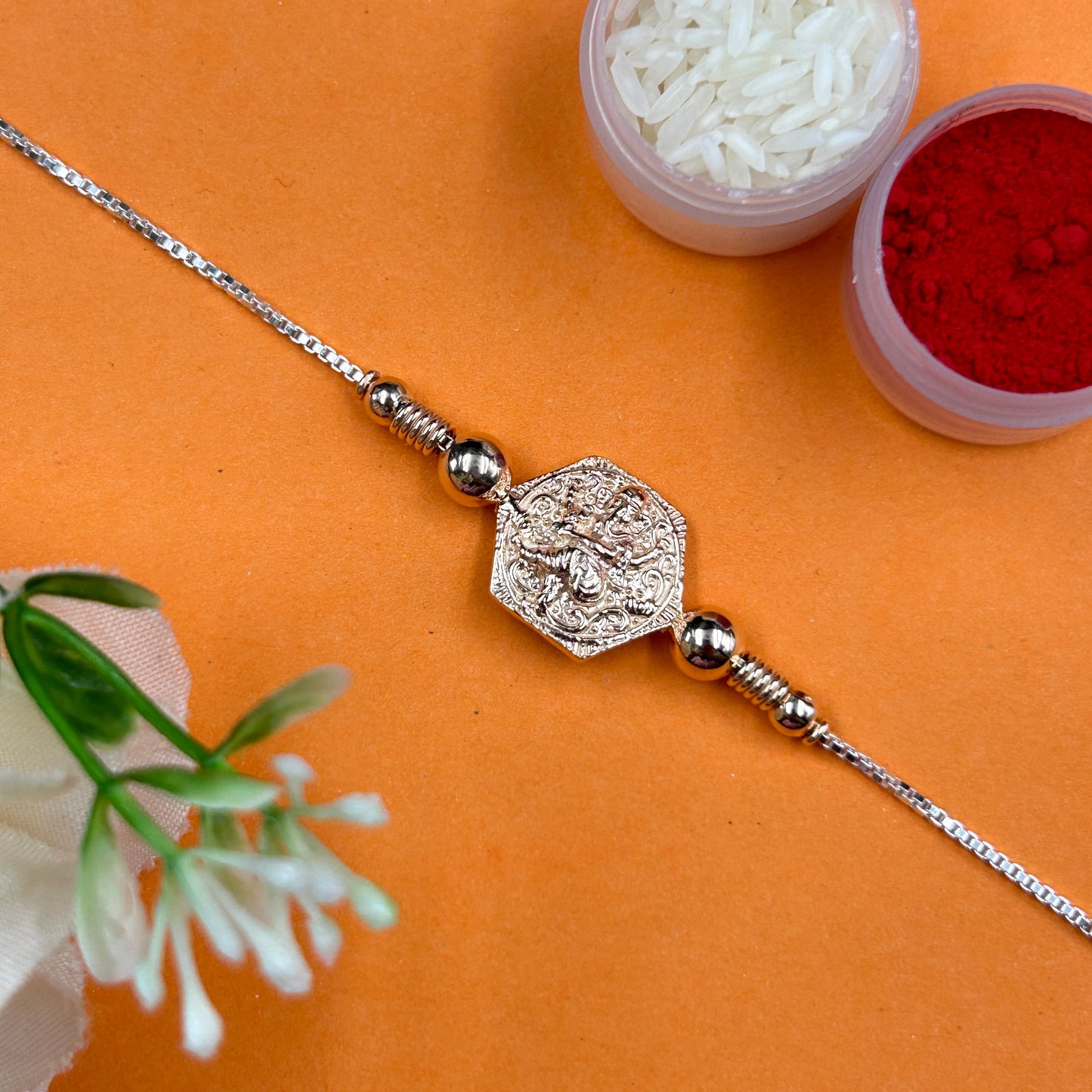 Rose Gold Ganesh Rakhi without Rudraksha