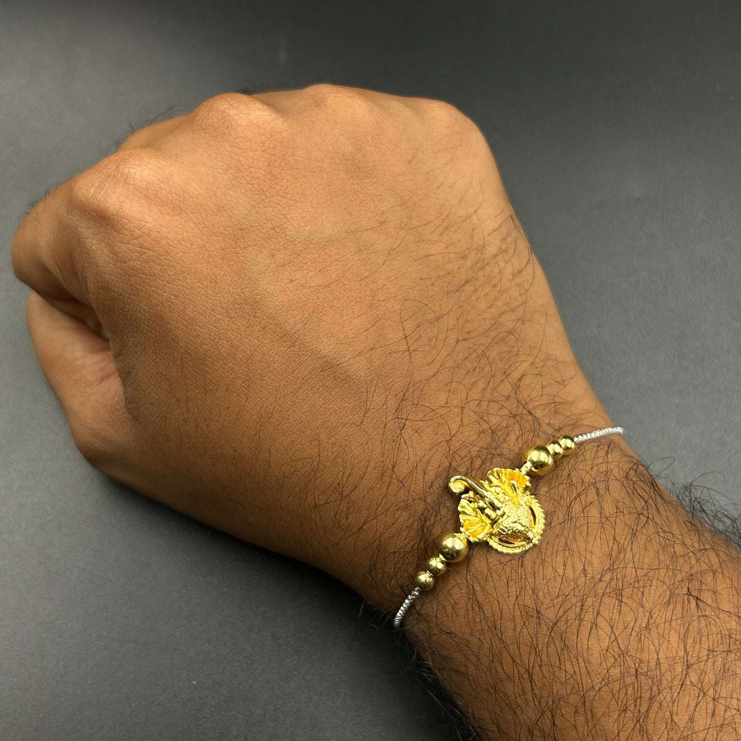 Yellow Gold Ganesh Rakhi without Rudraksh