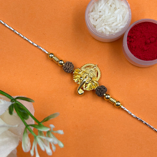 Yellow Gold Ganesh Rakhi with Rudraksh