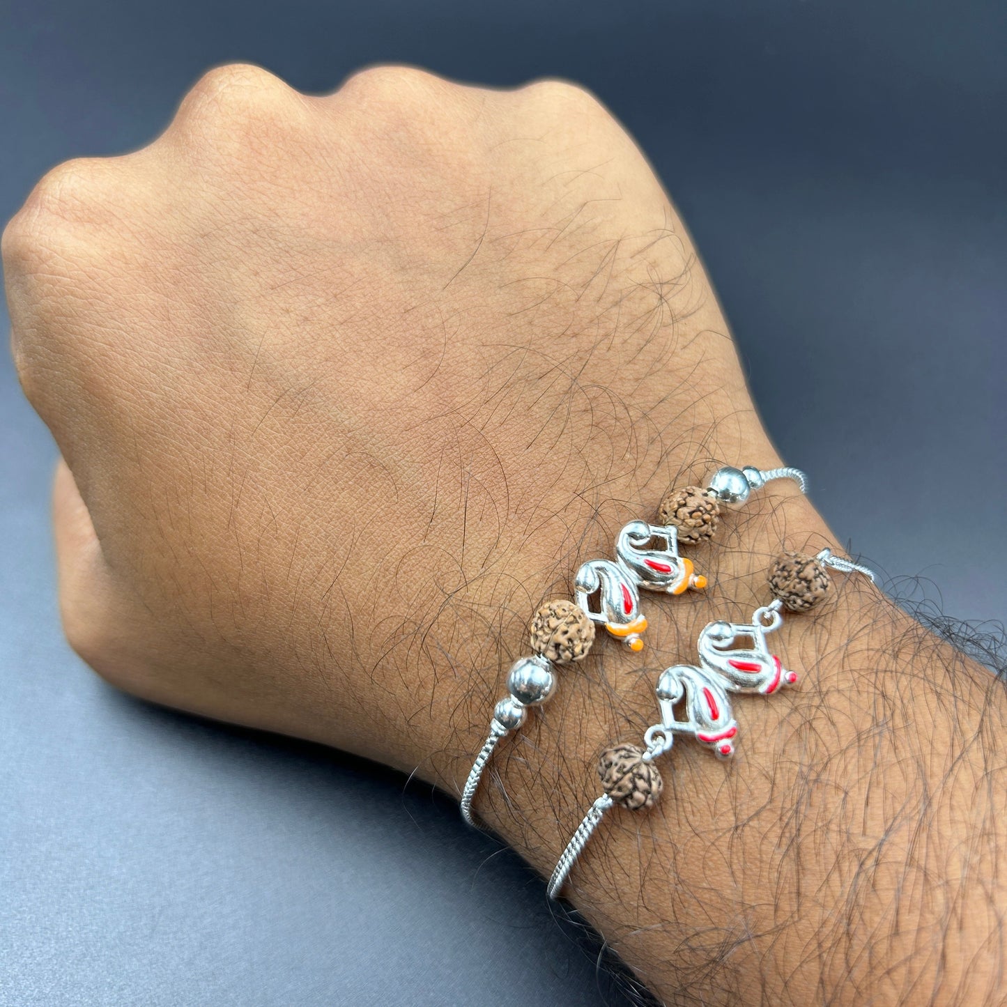 Silver Ganesh Rakhi with Rudraksh