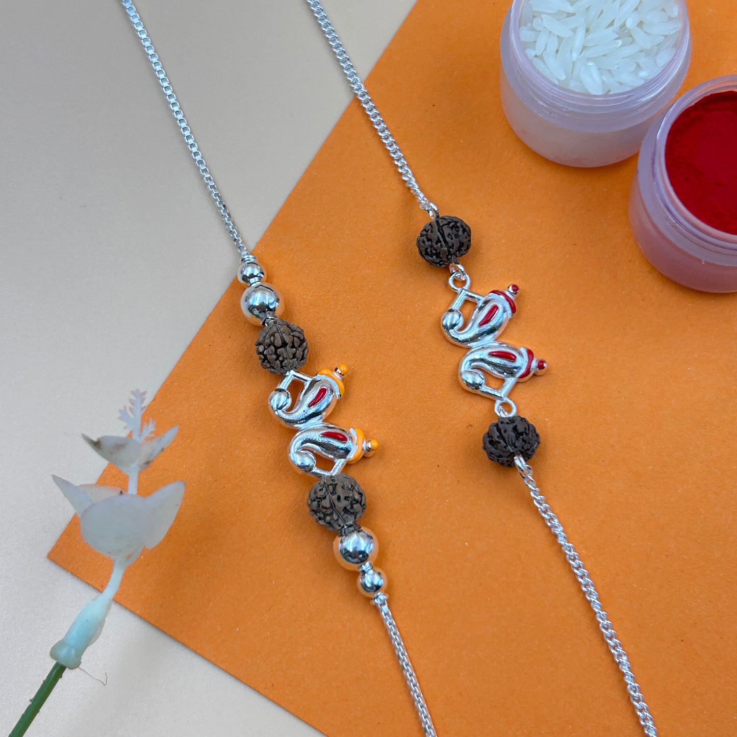 Silver Ganesh Rakhi with Rudraksh