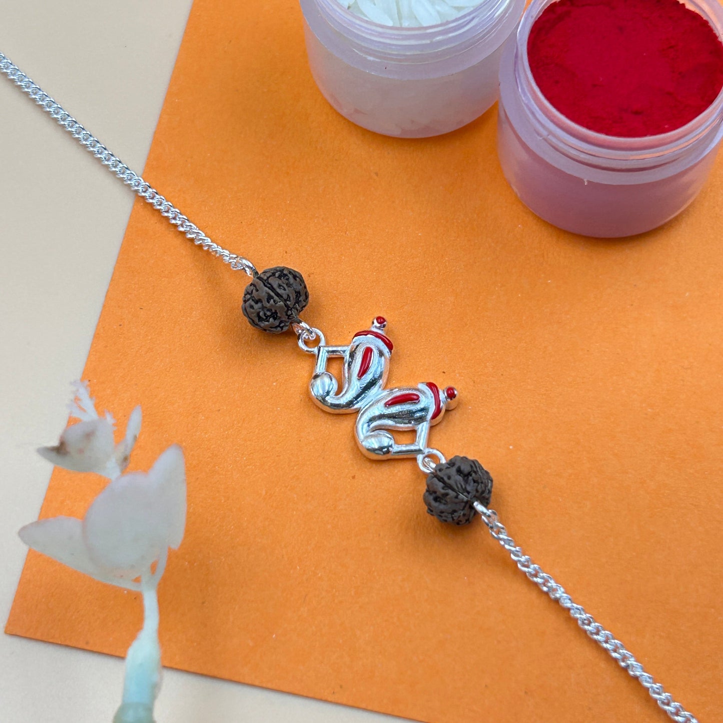 Silver Ganesh Rakhi with Rudraksh