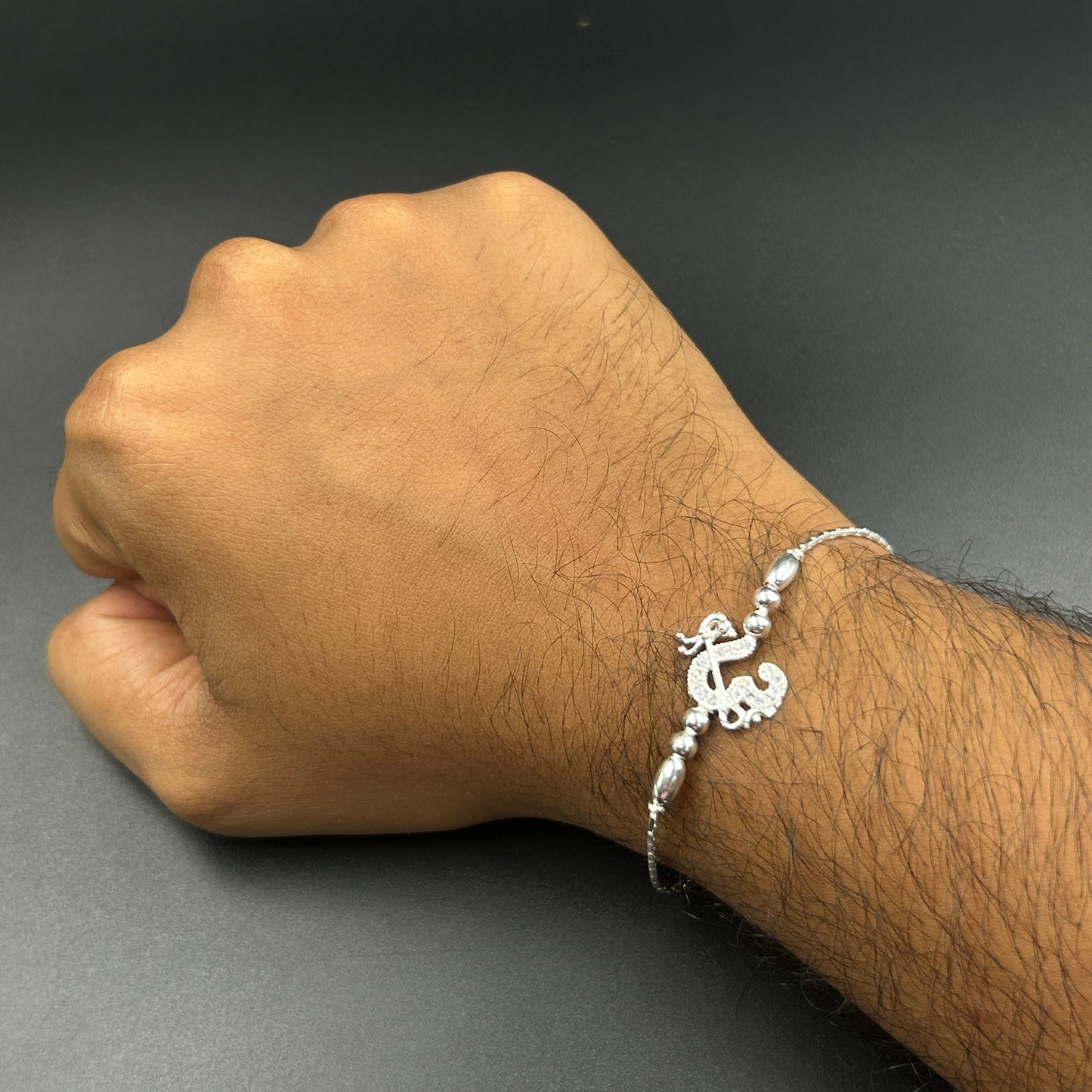 Silver OM Rakhi