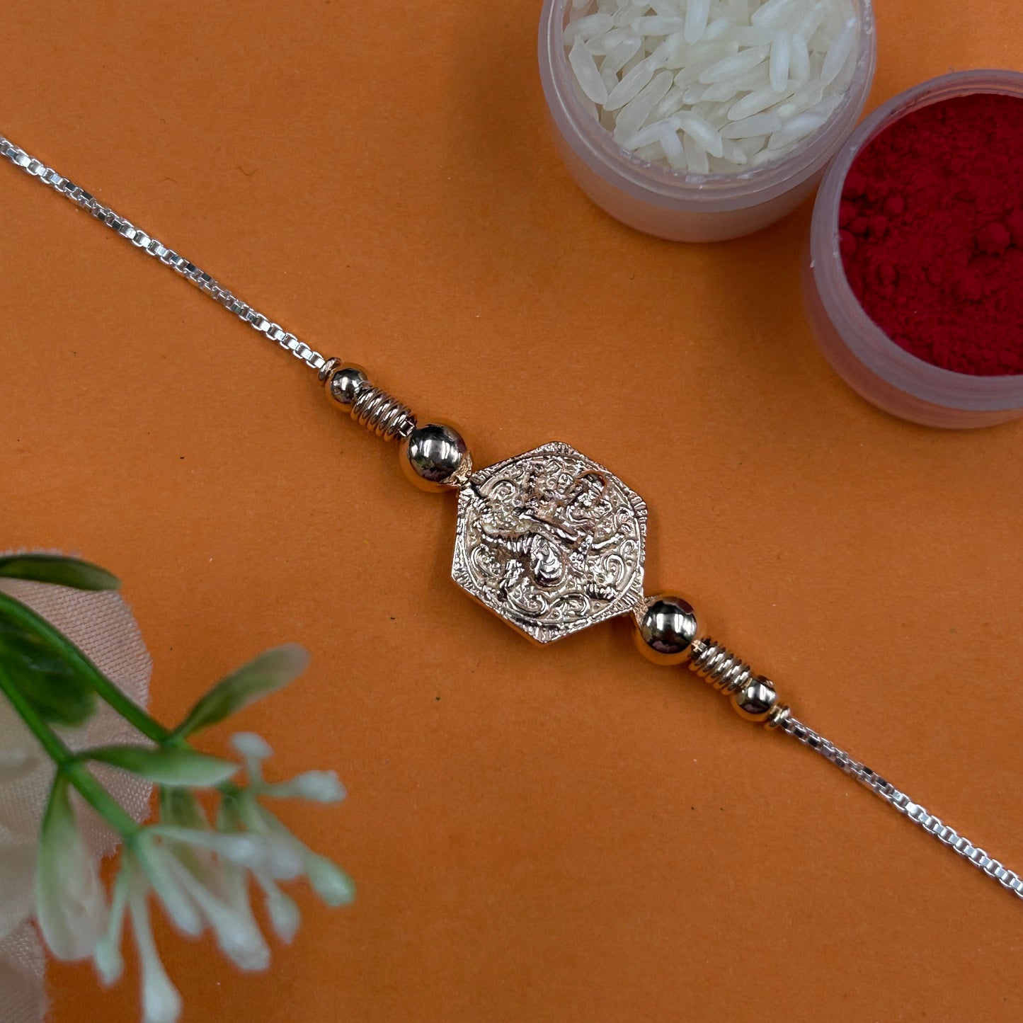 Rose Gold Ganesh Rakhi without Rudraksha