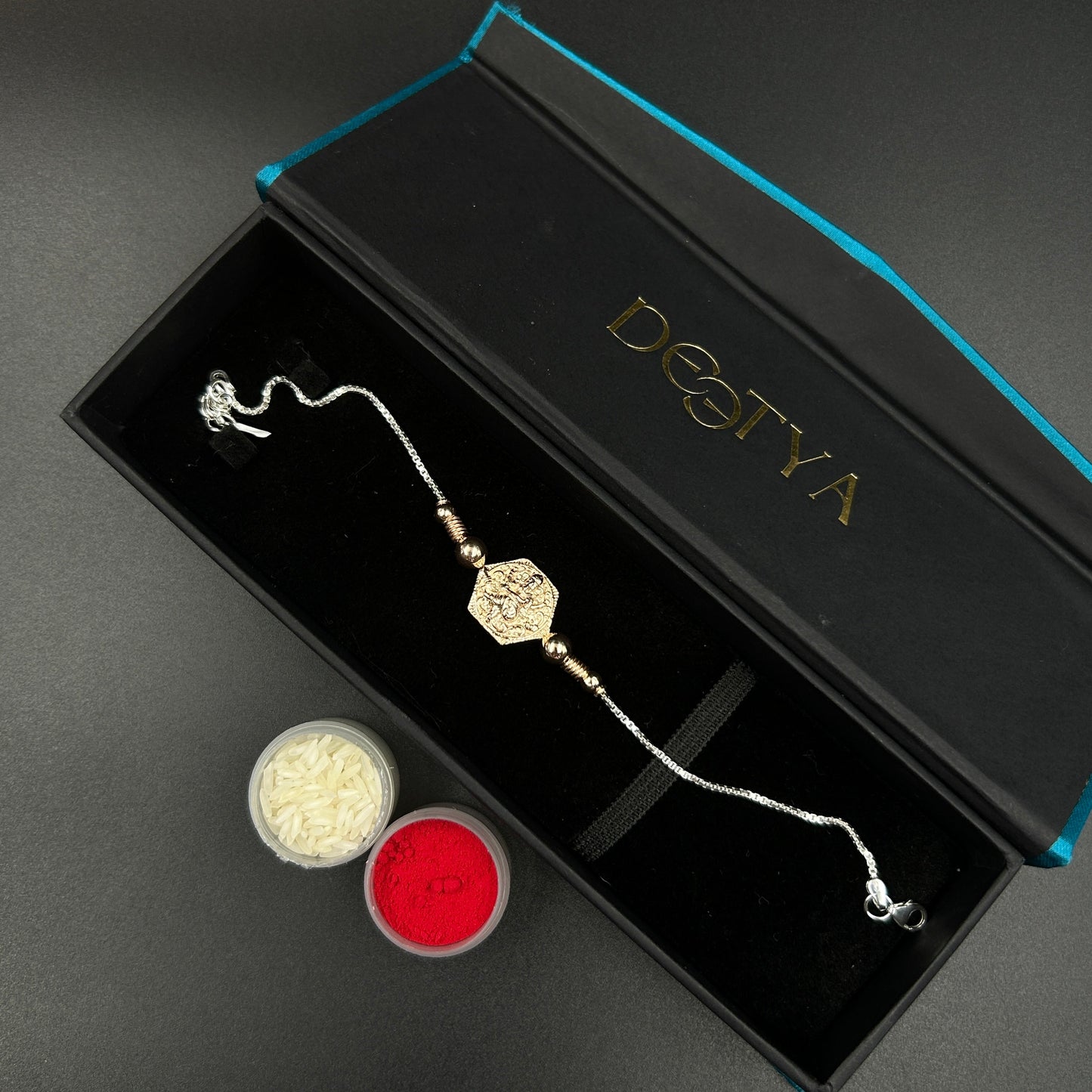 Rose Gold Ganesh Rakhi without Rudraksha