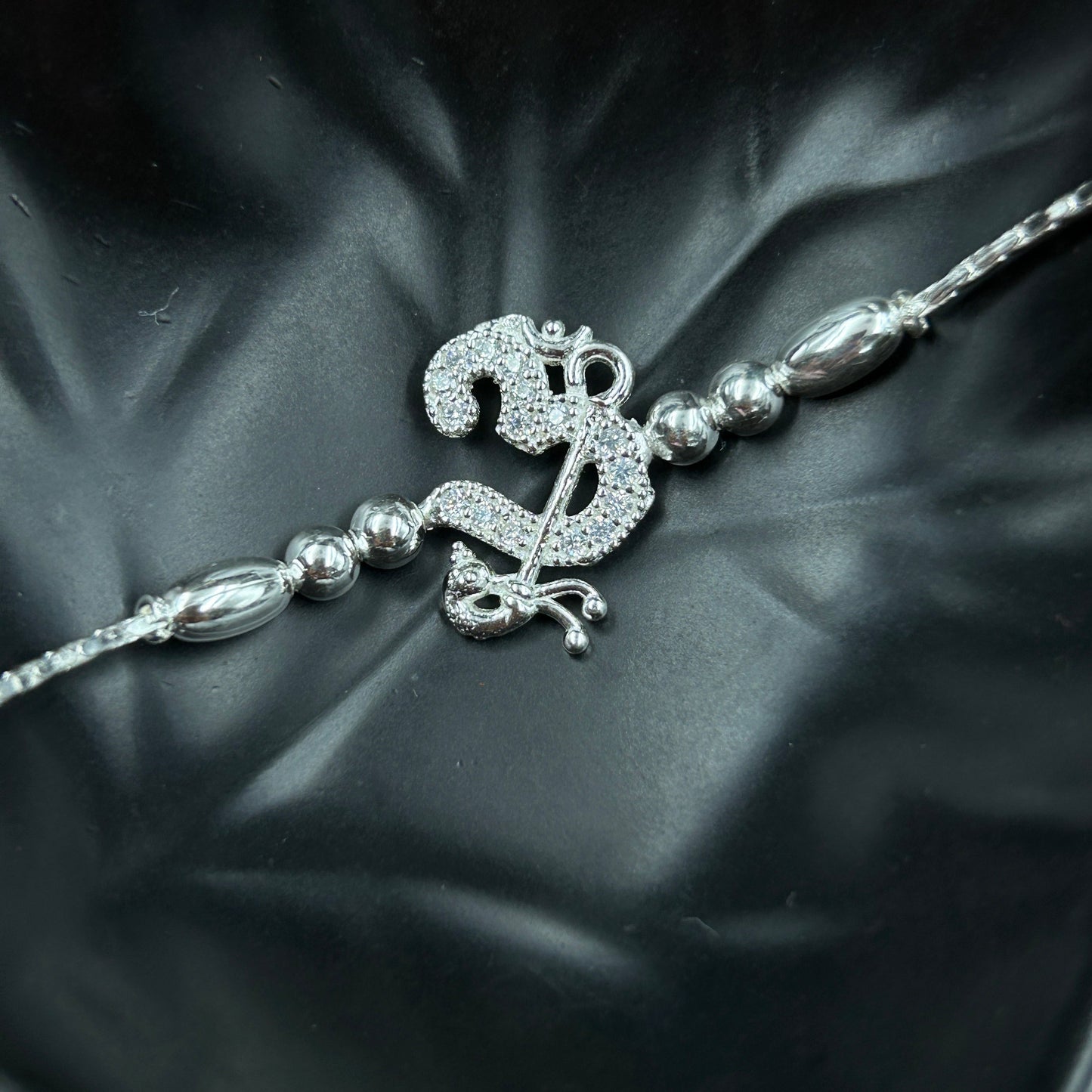 Silver OM Rakhi